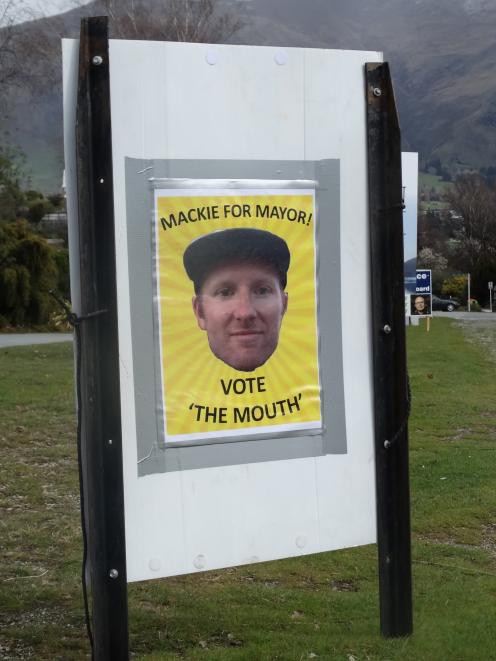 An unauthorised hoarding which appeared among other election candidates' hoardings on the side of State Highway 84 in Wanaka, asked people to vote Mackie \"The Mouth'' for mayor. Two signs were removed yesterday afternoon. Photo by Tim Miller.
