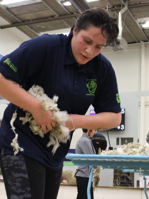 Pagan Karauria, of Alexandra, works her way to a second consecutive open woolhanding title.