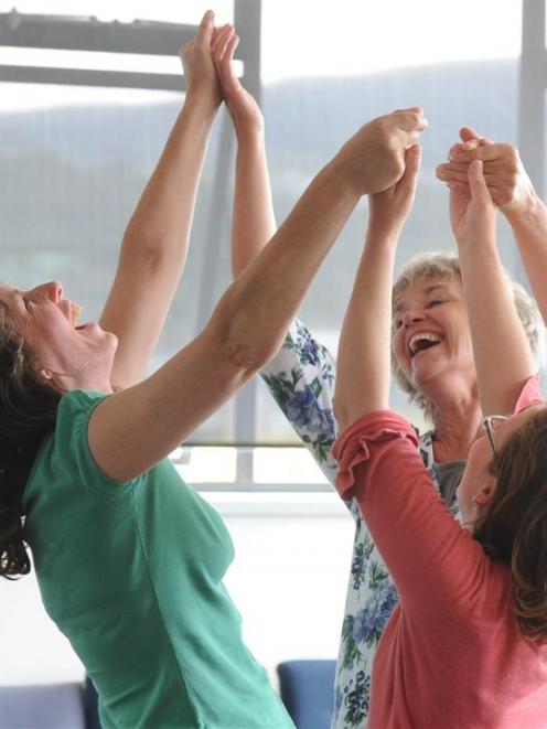 Dunedin Laughter Yoga Club members (clockwise from left) Christine Ogilvy (49) Anneloes de Groot ...