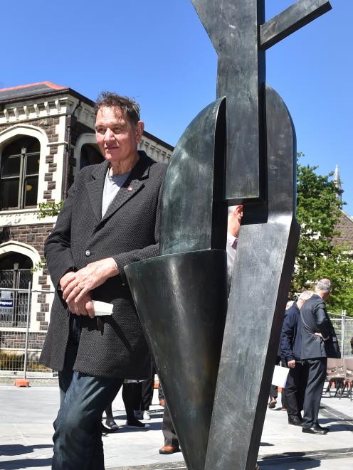 Palmerston North artist Dr Paul Dibble with one of the five bronze sculptures in his artwork...