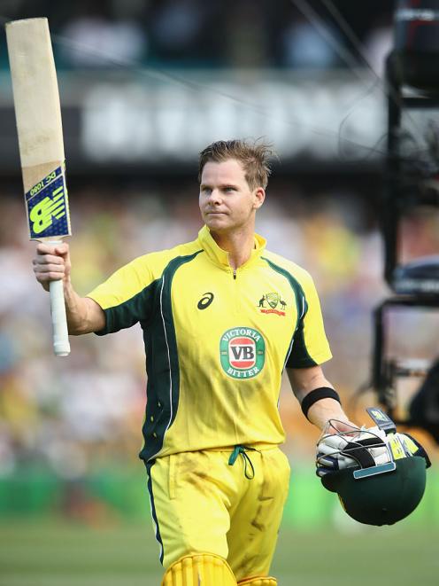 Australia's Steve Smith acknowledges the crowd as he leaves the field after scoring 164 against...