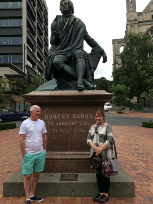 Frances Ainslie visits Dunedin's statue of Robbie Burns in the Octagon last year with friend Robert Beaton.