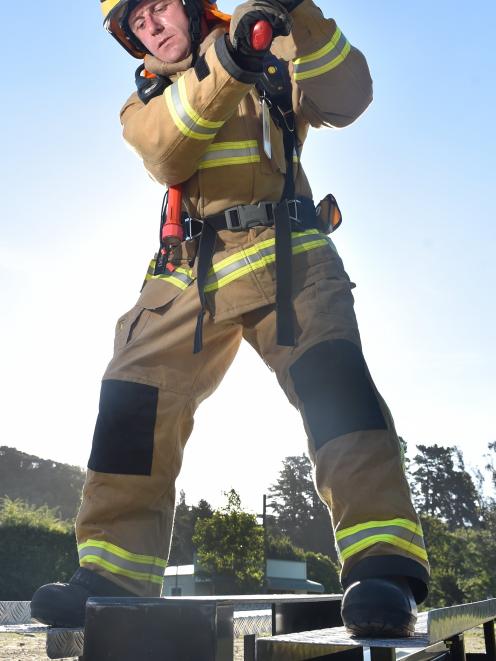 Waitati Volunteer Fire Brigade member Jody Williams tests a Keiser Force machine in Waitati in...