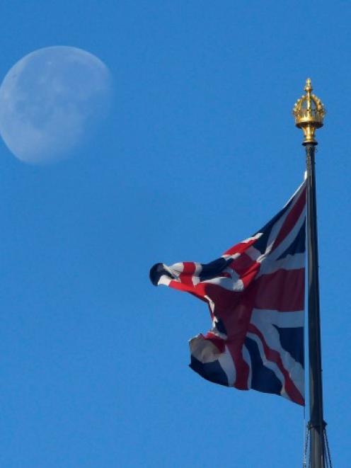 A Union flag flies in central London. Photo Reuters