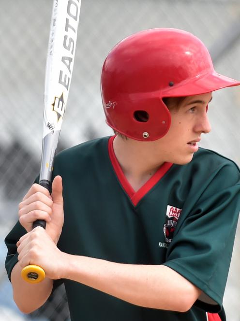 Kaikorai Valley College pupil Cayden Scott (15, left) prepares for a pitch during a match against...