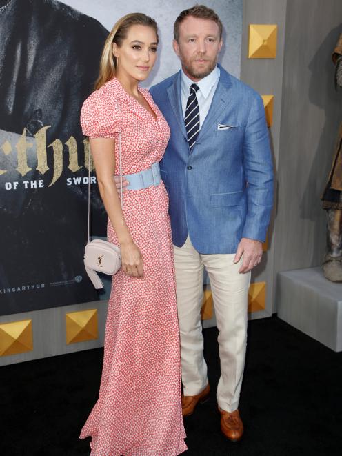 Director Guy Ritchie and wife Jacqui Ainsley attended the premiere of "King Arthur. Photo: Reuters