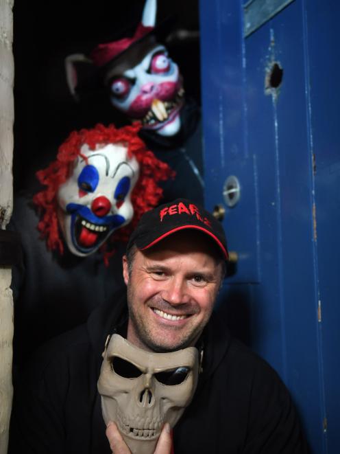 Fear NZ director Rory Foley in the old Dunedin Prison with friends yesterday. Photo: Stephen...