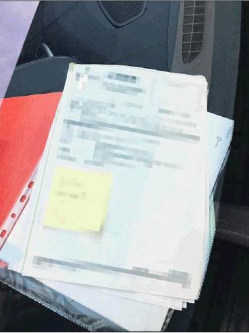 A file was left open on a police dash in Auckland. Photo: NZ Herald