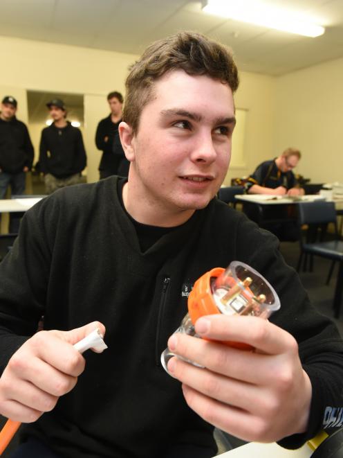 Jordan Trainor (19), of Dunedin, wires a plug on a motor in the Otago heats of the Master Electricians New Zealand apprentice challenge in Dunedin yesterday. Photo: Gregor Richardson