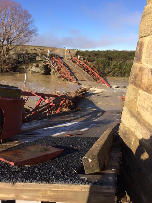 The Sutton suspension bridge d after the flood.