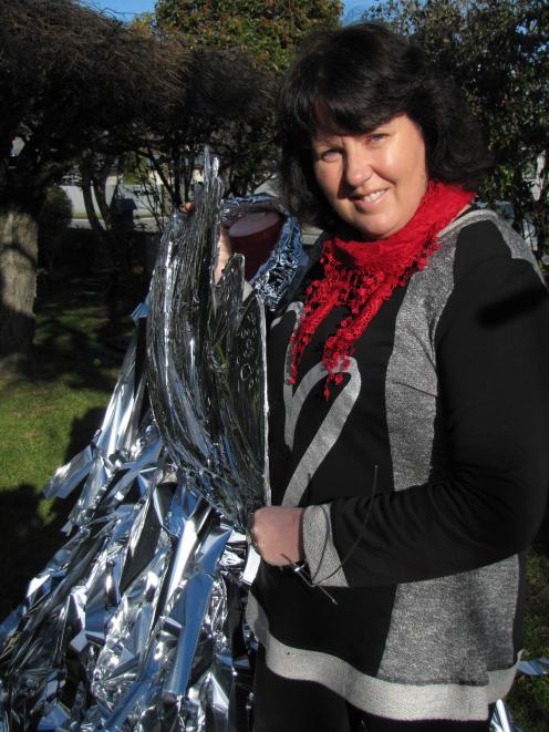 Cromwell designer Julie Morton provides a sneak peek at the ``Silver Tink'' she is making for this year's Trashion Show in Cromwell. Organisers are making an early call for registrations of interest for the annual event. Photo: Pam Jones