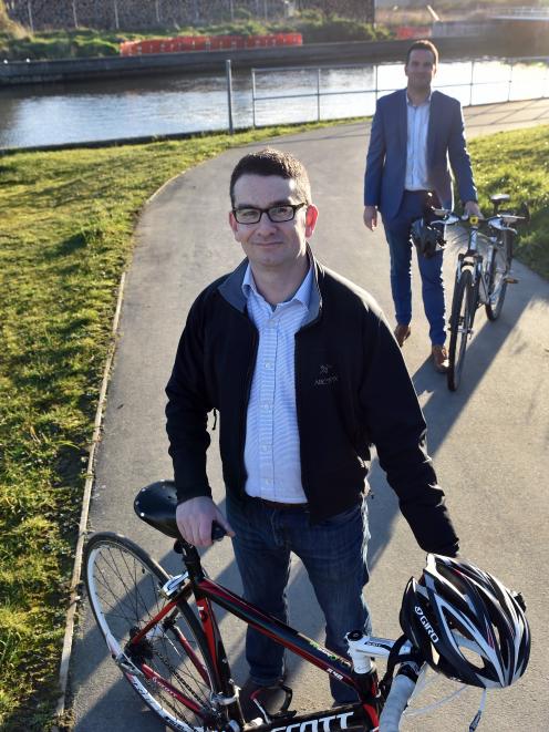 Spokes Dunedin chairman Jon Dean (left) and Dunedin City Council transport group manager Richard...