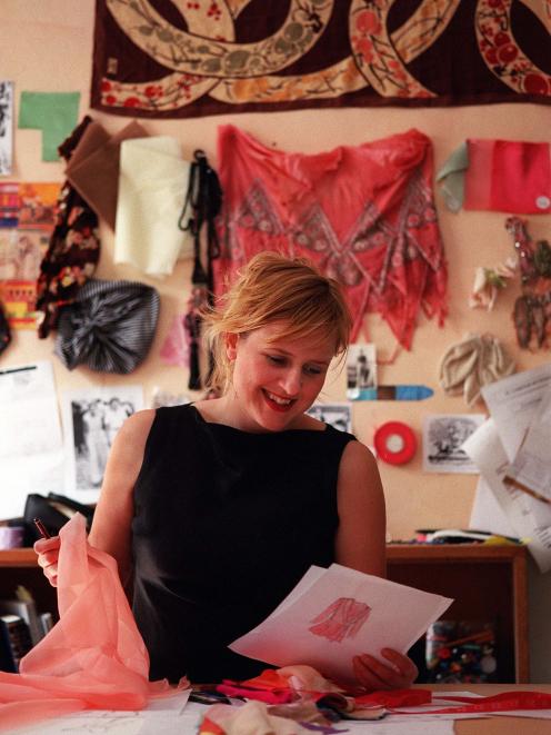 Tanya Carlson looks over design sketches for Australian Fashion Week in 2001. Photo: ODT.