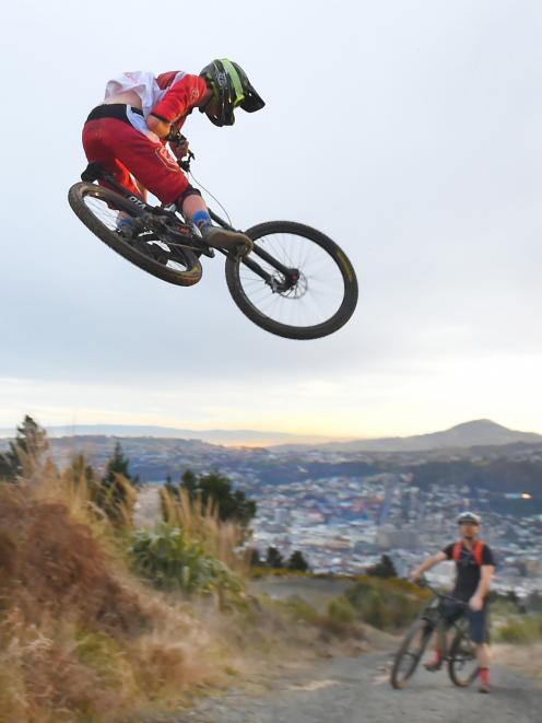 Otago downhill champion Calum Booth (Dunedin) takes a jump on the Signal Hill downhill track as...