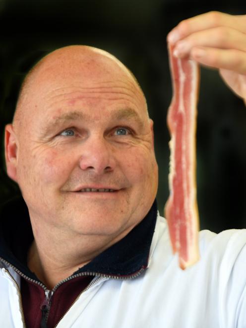 Simon Tiefenbach, from Deep Creek Deli, with his bronze medal-winning streaky bacon. Photo: Stephen Jaquiery