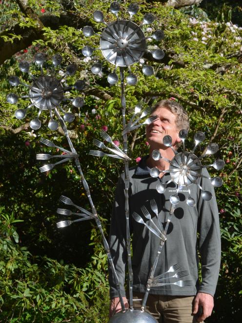 Glenfalloch gardener Alan Funnell with the sculpture he built from old cutlery for the Glenfalloch garden. Photo: Stephen Jaquiery