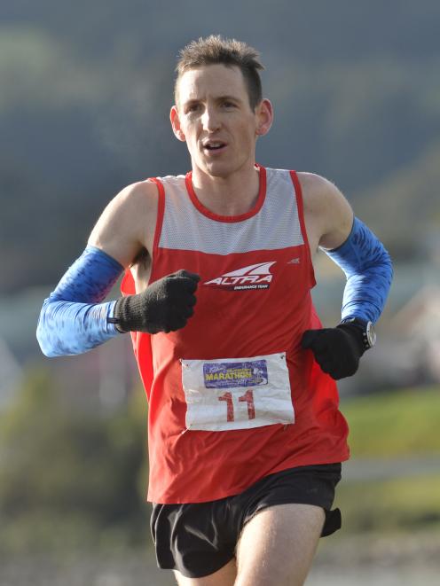 Wellington runner Sam McCutcheon on his way to winning the Dunedin marathon yesterday. Photo:...
