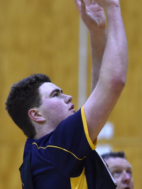 Dunedin men's netball player Connor Keichen aims for the goal in training at the Kaikorai Valley College gym earlier this week. Photo: Gregor Richardson