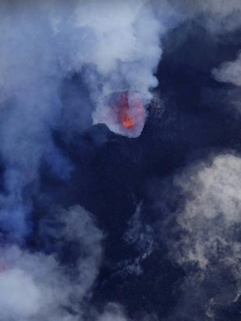 A cloud of smoke from Manaro Voui volcano is seen on Vanuatu's northern island Ambae. Photo: Thomas Boyer via Reuters