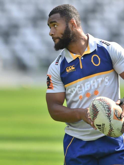 Otago teenage winger Jona Nareki passes the ball during a training session at Forsyth Barr...