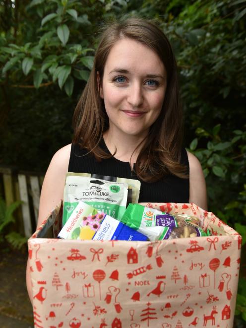 Dunedin student Rosie Naylor is collecting donations for Christmas hampers she will give to Women's Refuge. Photo: Gregor Richardson
