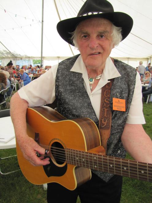 Cromwell country singer Dusty Spittle gets ready to perform at the Cromwell Gold ’n’ Notes...