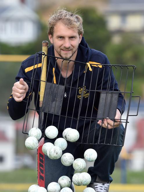 Taieri hockey club stalwart Dean Williamson (31) at the McMillan hockey turf yesterday after...