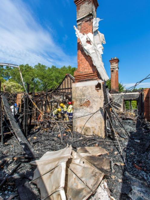 Police are calling for witnesses to come forward with any information about the suspicious fire which ripped through the abandoned Glamis Hospital building in Mornington on Sunday morning. Photo: New Zealand Police