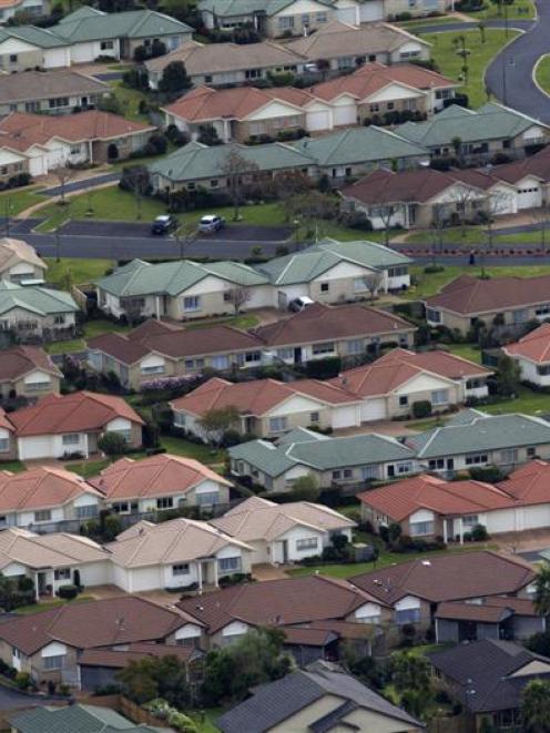 A view of suburban housing south of Auckland.  Photo by The New Zealand Herald.