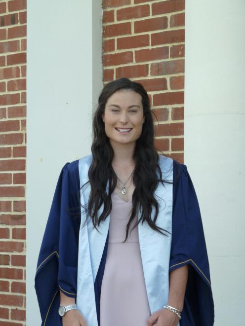 Performance analyst Anna Higgins in her Otago Polytechnic graduation gown. Photo: Supplied