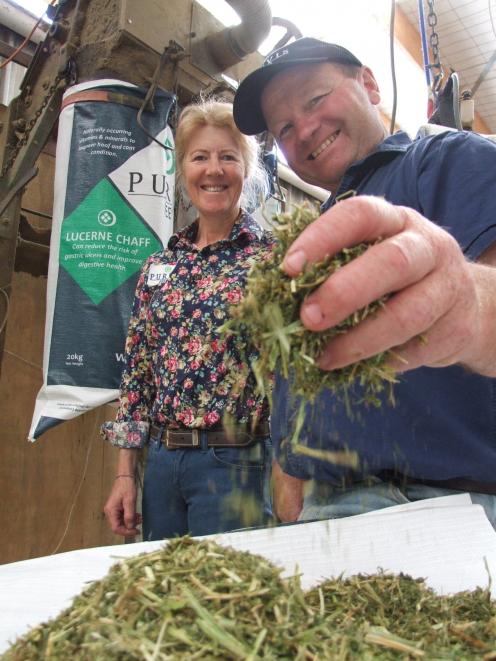Henrietta and Graeme Purvis, of Purvis Feeds, at Waianakarua, with their lucerne chaff. Photos:...