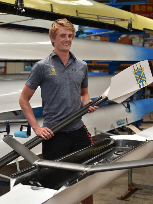 Corey Lewis (20) at the Otago University Rowing Club boat sheds on Thursday as he prepares for...