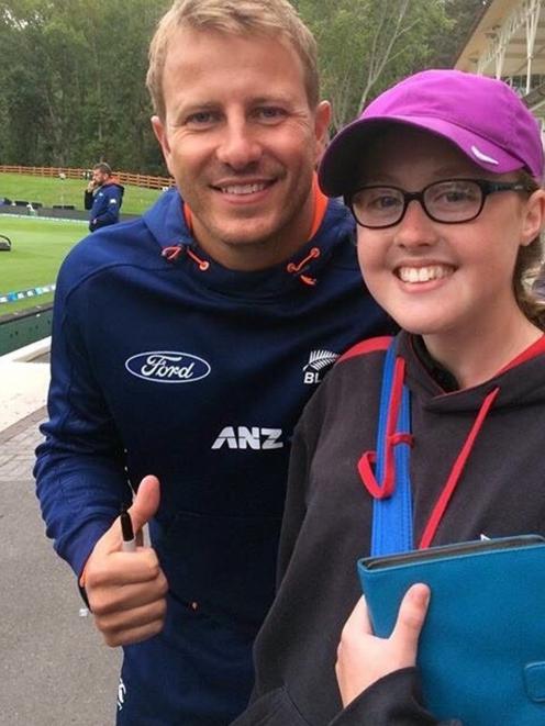 Lilly Paterson poses with Otago and New Zealand test bowling star Neil Wagner at the University...