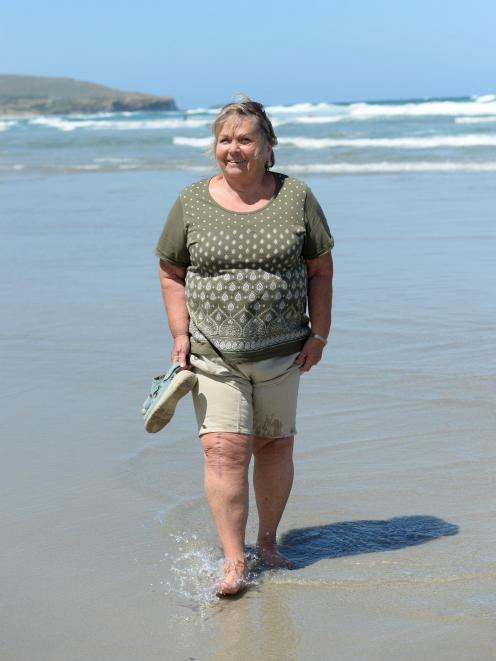 Lynne Holden, of Waikouaiti, enjoys the surf at St Clair beach yesterday in Dunedin. Photo: Lynda Robertson