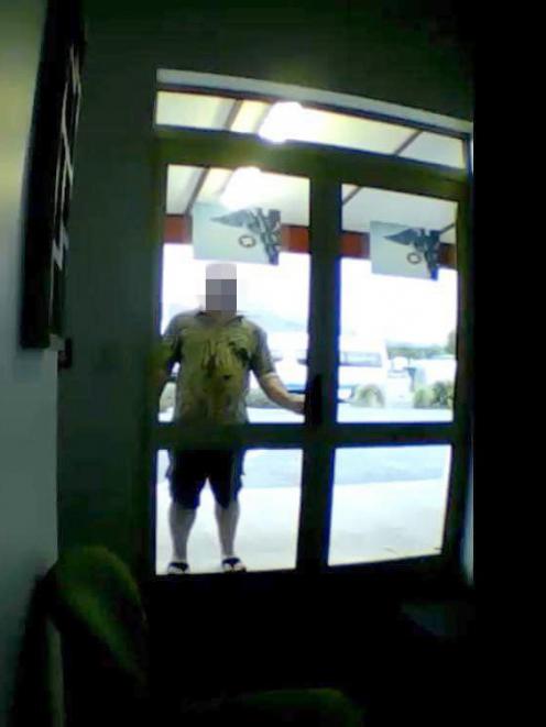 Security camera footage catches a man allegedly tampering with the locks at the Mackenzie Health Centre in Twizel. Photo: Supplied