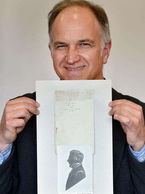 University of Otago English and linguistics senior lecturer Dr Thomas McLean holds the manuscript...