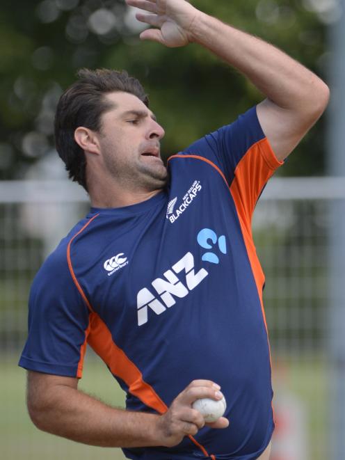 Black Caps all-rounder Colin de Grandhomme bowls during a training session at the University Oval...