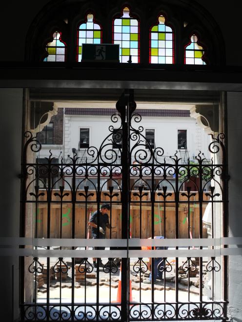 Finishing touches are put to the outside of the Law Courts building, which reopens today after...