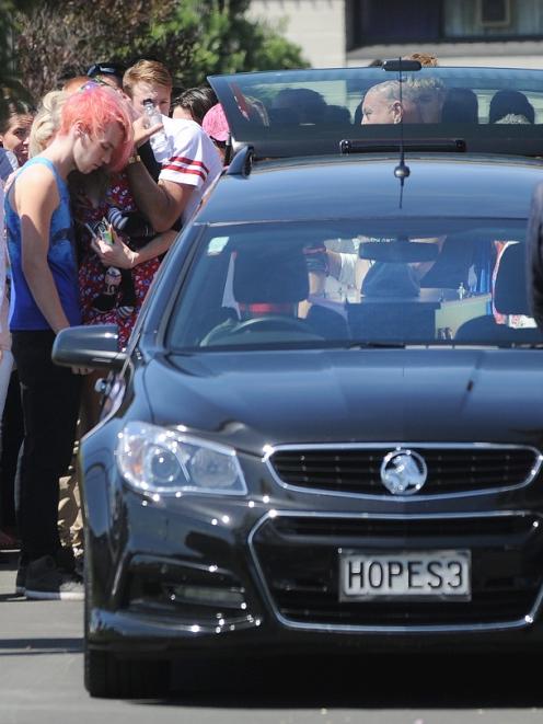 Mourners were encouraged to wear coloured clothing. Photo: Christine O'Connor