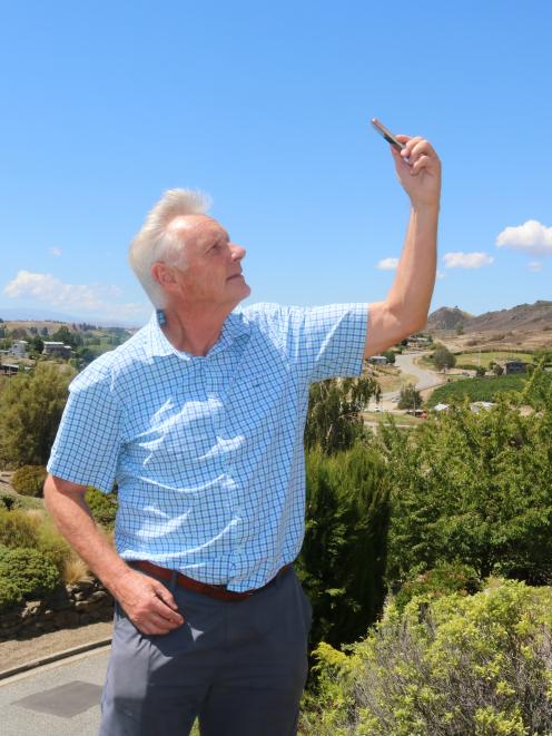 Richard McKenzie tests the uv2Day app in the hot Alexandra sun. Photo: Tom Kitchin