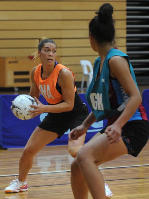 Silver Ferns goal attack Grace Kara (nee Rasmussen) controls the ball as Southern Steel goal keep Taneisha Fifita looks on during the training match at the Edgar Centre yesterday. Photo: Christine O'Connor