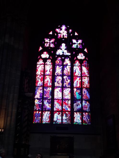 Glorious stained-glass windows inside Prague Cathedral.