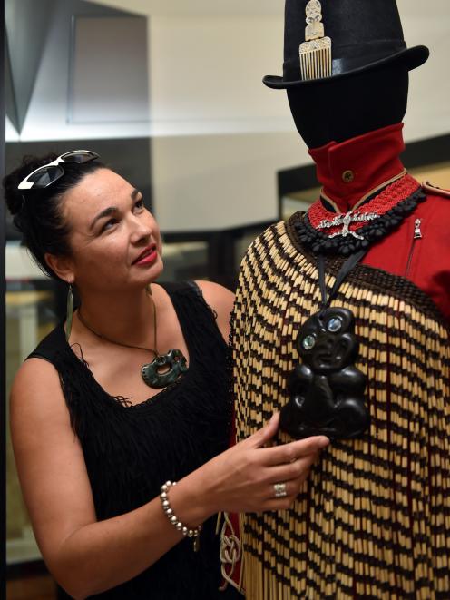 Dunedin fashion designer Amber Bridgman adjusts an ensemble she has created, at the Toitu Otago...