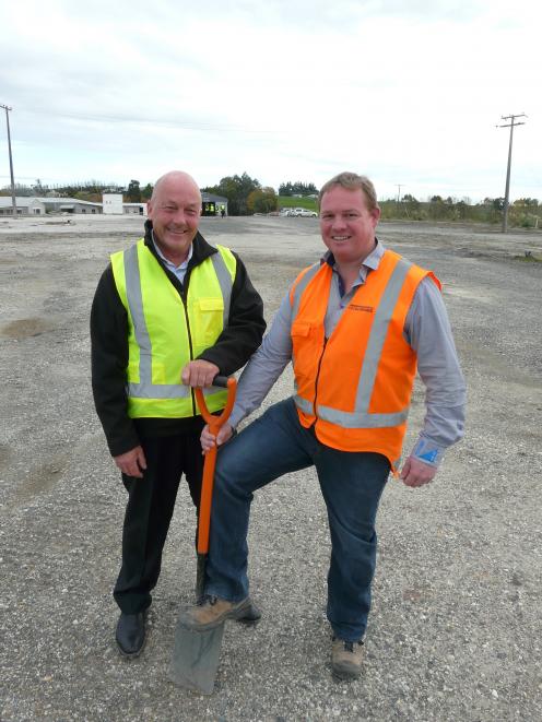 Clutha District Mayor Bryan Cadogan (left) and SouthRoads Ltd construction division manager...