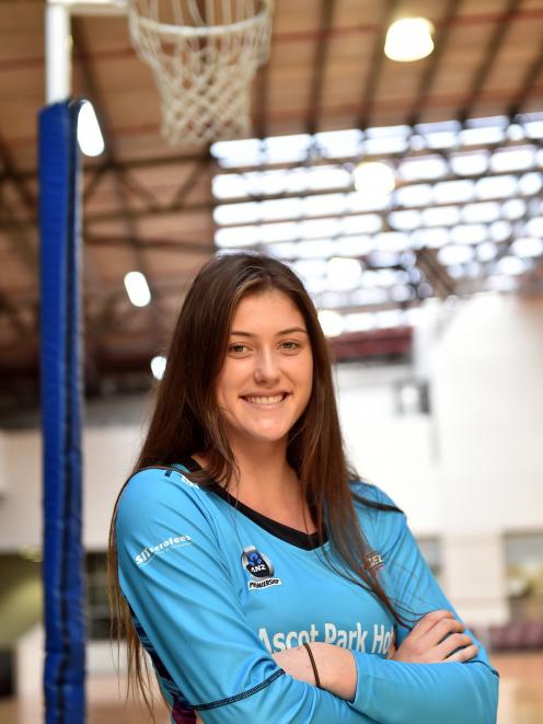 Kate Heffernan (18)  relaxes for a moment at the Edgar Centre this week after playing for the...