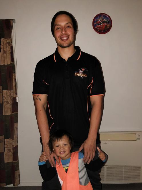 New Southland Shark Lydon Aoake, pictured with his son, LJ Meaola-Hill (2), is set to travel to...