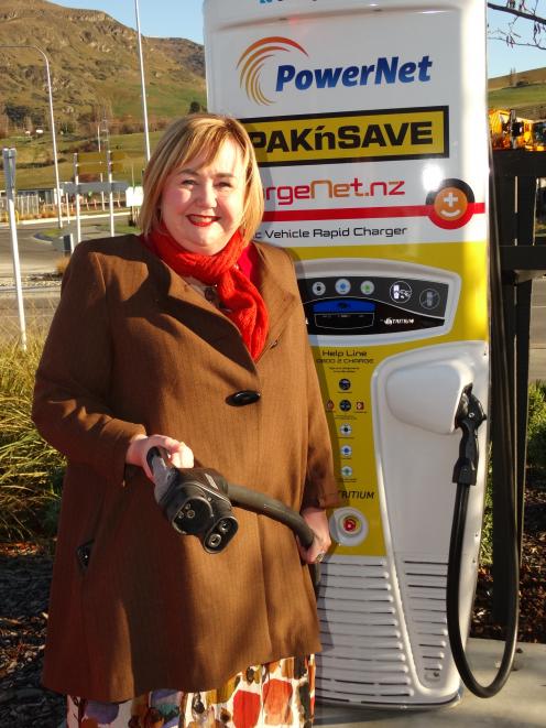 Energy and Resources Minister Megan Woods unveils Queenstown's first high-speed electric vehicle charger at the Pak'nSave supermarket car park in Frankton yesterday. Photo: Guy Williams