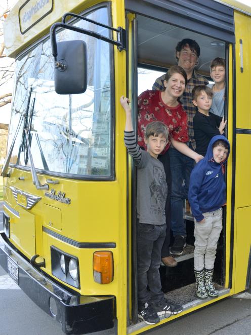 Chris and Erinna Lane with their sons (anti-clockwise from bottom left ) Noah (10), Lachie (8),...