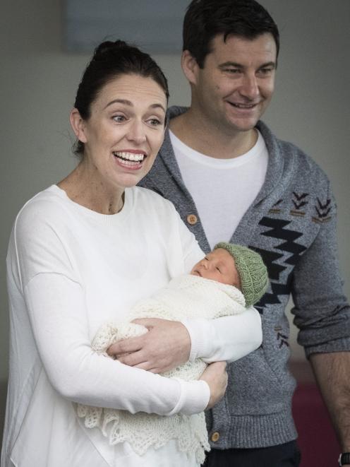 Prime Minister Jacinda Ardern and partner Clarke Gayford show off their baby girl, Neve Te...