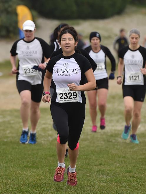 Celia Lie competes in the Barnes Cross-country races at Kettle Park yesterday. Photo: Gregor...